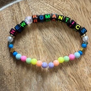 5 for $20 Taylor Swift Handmade Friendship Beaded Bracelet
“New Romantics”